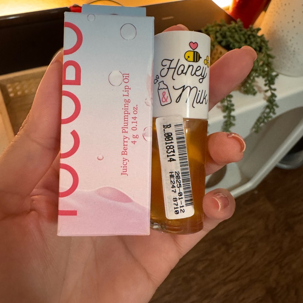 Tocobo plumping lip oil in cozy pink and apieu honey & milk lip oil duo